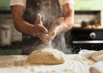 Baker making fresh bread
