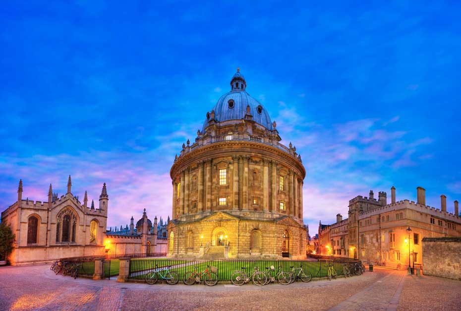 The Bodleian Library at dusk, a must see attraction on a visit to the cotswolds, bath and oxford.