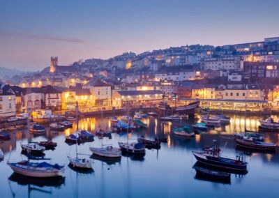 A photo of Brixham harbour in Devon, one of the images highlighting vacations in England from Turas Travel