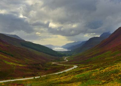 The scenic road to Loch Maree, a key part of the North Coast 500 Vacation Itinerary from Turas Travel.