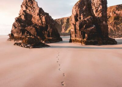 footsteps on the sand passing through the outer hebrides