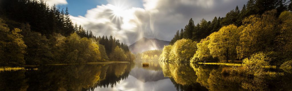 a reflective loch in scotland. Used on the what we do page of Turas Travel