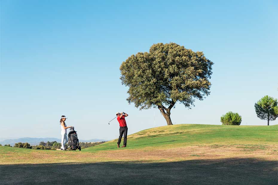 player and caddie playing in UK