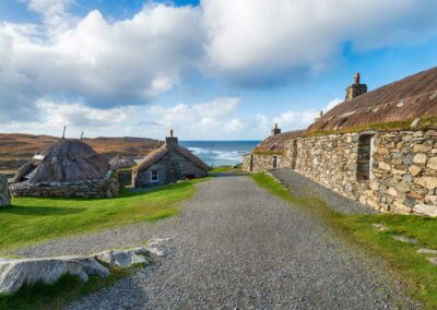 Thatched Blackhouses on the Isle of Lewis. Used to illustrate the history and culture of the UK on the Turas Travel website.
